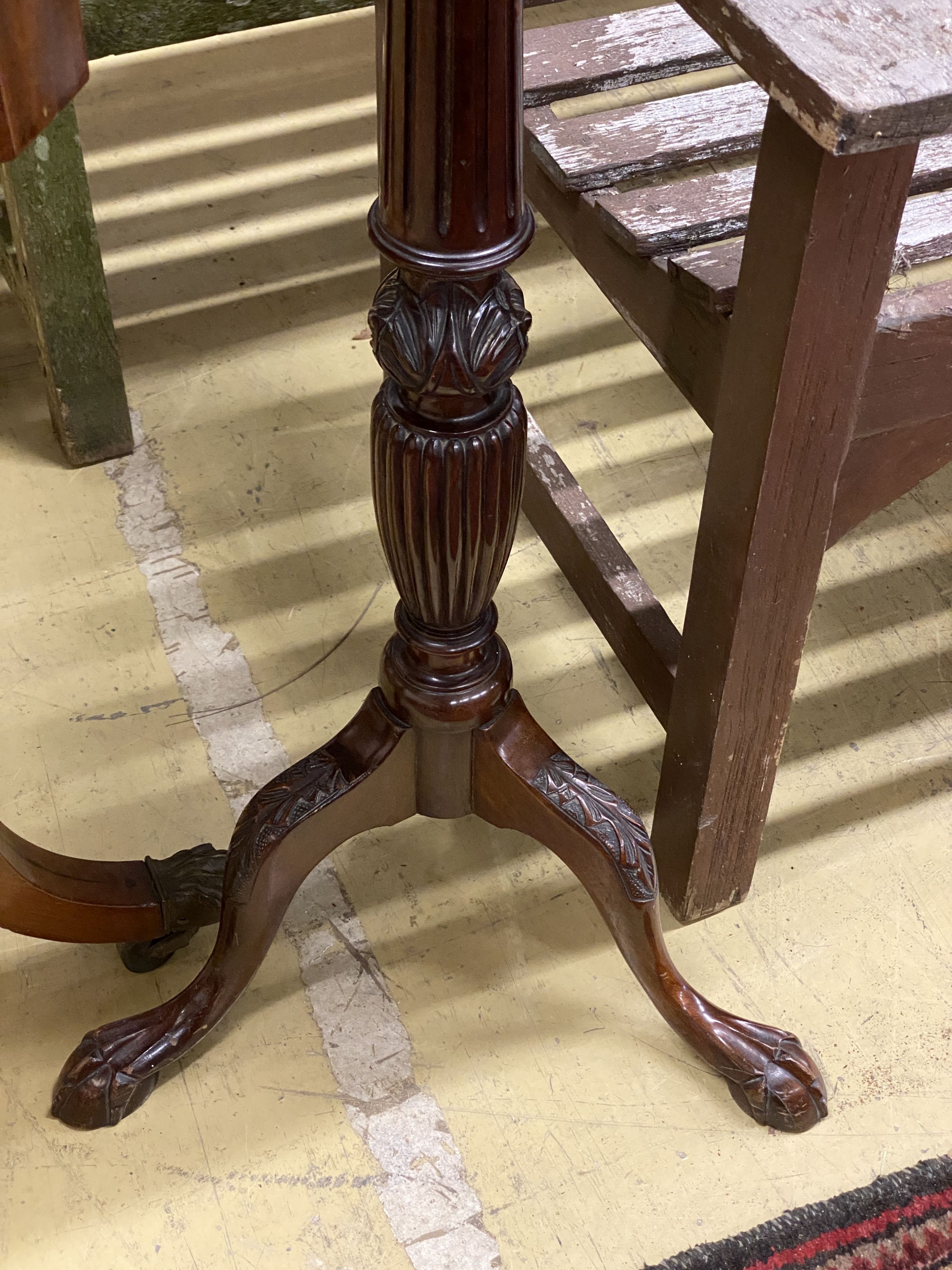 An Edwardian George III style mahogany torchere, height 176cm